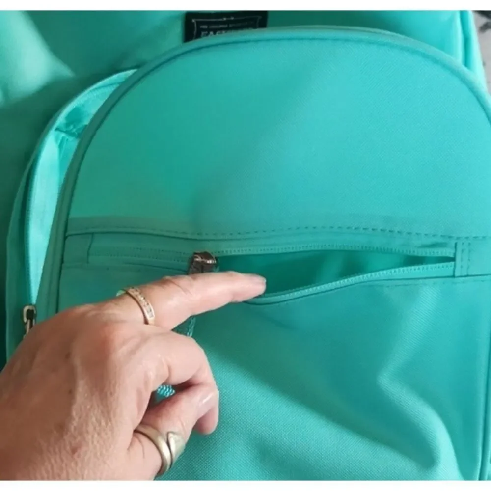 Green Eastport backpack 4 book capacity Laptop sleeve Water bottle pockets NWT